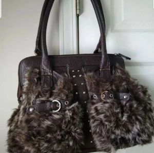 Like new leather brown faux purse
Minor flaws as s
